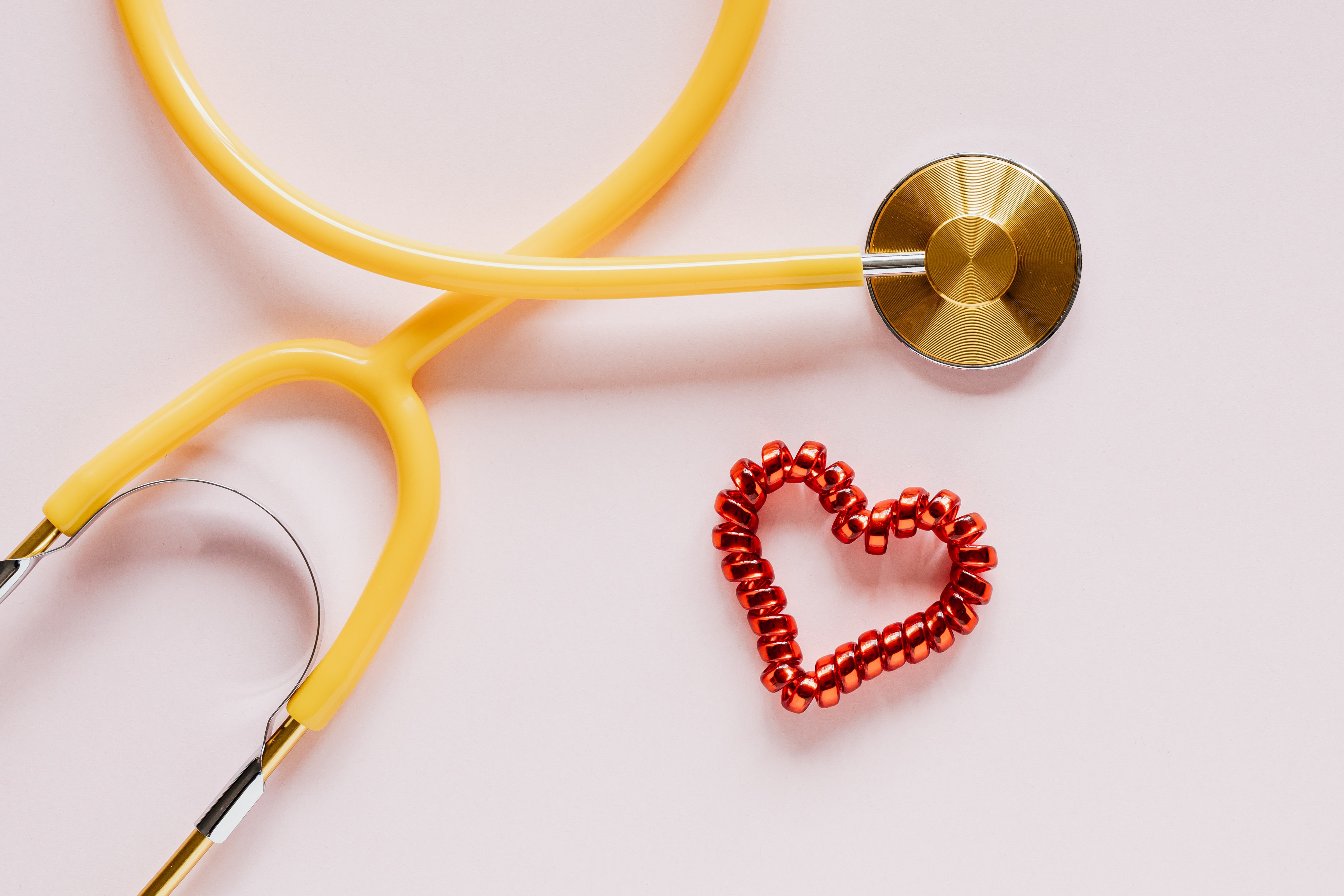 a stethoscope with a heart next to it